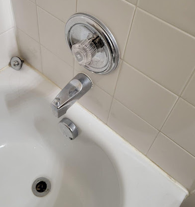 Plumber repairing pipe